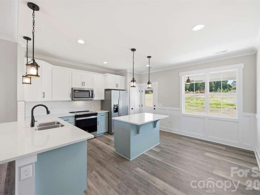 1010 Speight Road, Albemarle, NC 28001.  MLS# CAR4354152, YatesRealty ID 7662. Kitchen with Beach Vibes!