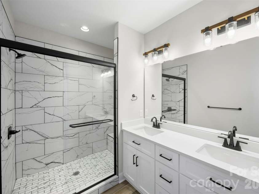 1010 Speight Road, Albemarle, NC 28001.  MLS# CAR4354152, YatesRealty ID 7662. Primary Oversized Tile Shower