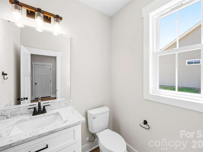 1004 Speight Road, Albemarle, NC 28001.  MLS# CAR4351117, YatesRealty ID 7663. Half Bath Down