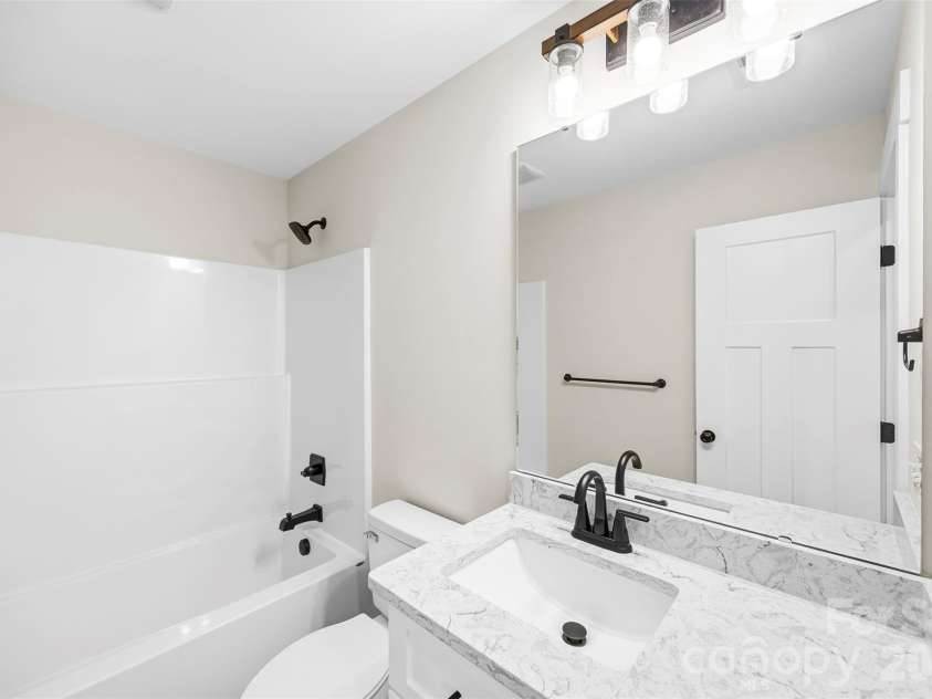 1004 Speight Road, Albemarle, NC 28001.  MLS# CAR4351117, YatesRealty ID 7663. Secondary Bathroom