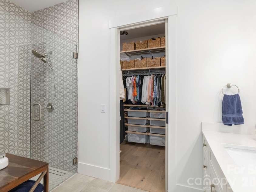 40 Hidden Pond Lane, Brevard, NC 28712.  MLS# CAR4355096, YatesRealty ID 7664. Custom walk-in closet