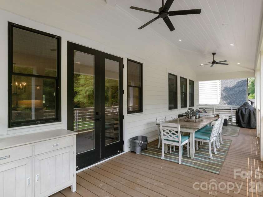 40 Hidden Pond Lane, Brevard, NC 28712.  MLS# CAR4355096, YatesRealty ID 7664. Eat on the back patio