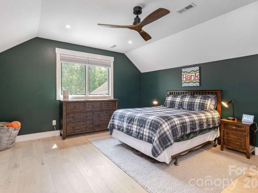 40 Hidden Pond Lane, Brevard, NC 28712.  MLS# CAR4355096, YatesRealty ID 7664. Large second bedroom on the upper level