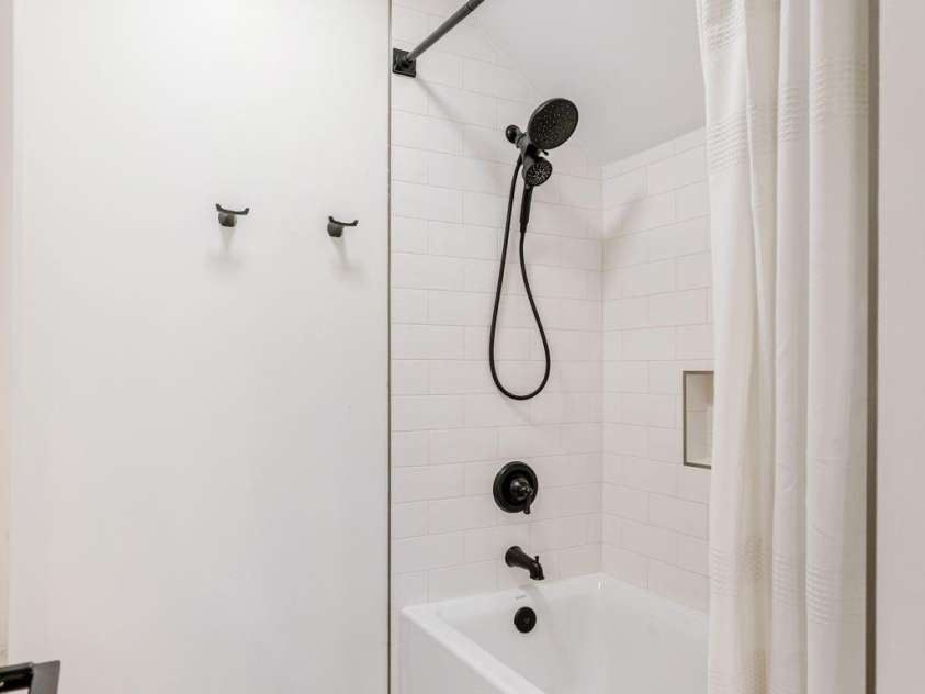 40 Hidden Pond Lane, Brevard, NC 28712.  MLS# CAR4355096, YatesRealty ID 7664. Second floor shower