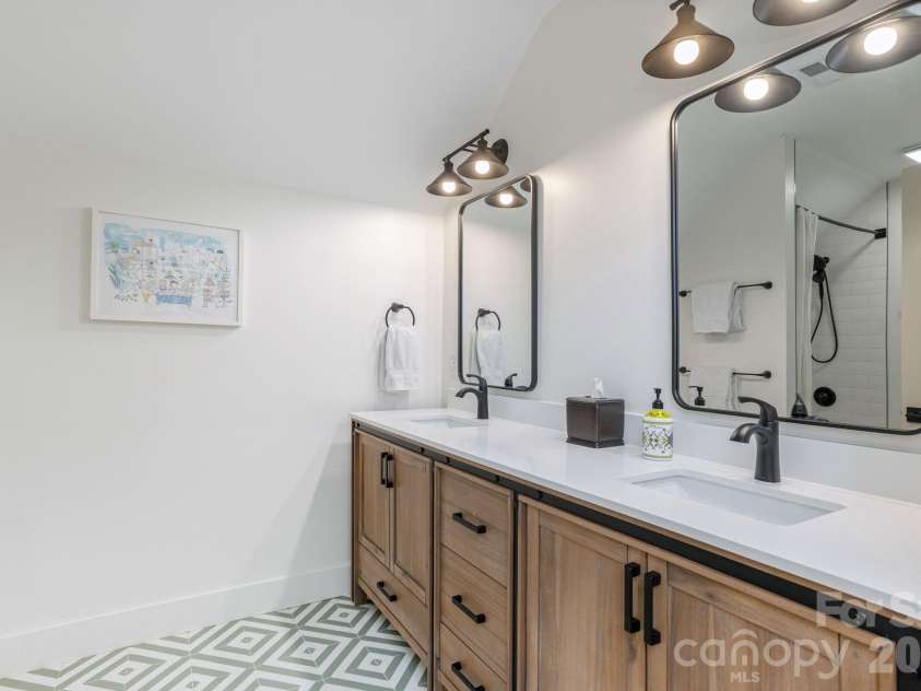 40 Hidden Pond Lane, Brevard, NC 28712.  MLS# CAR4355096, YatesRealty ID 7664. Second floor vanity with double sinks