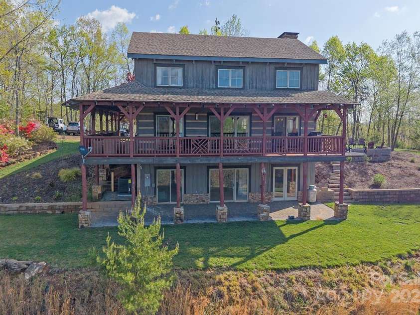 723 Highland Road, Mill Spring, NC 28756.  MLS# CAR4244652, YatesRealty ID 7670. Back of Main House