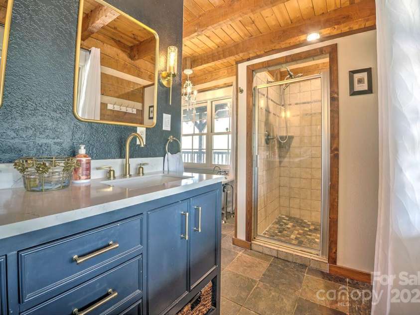 723 Highland Road, Mill Spring, NC 28756.  MLS# CAR4244652, YatesRealty ID 7670. Bath