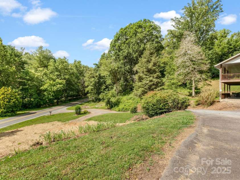 515 Pond Road, Asheville, NC 28806.  MLS# CAR4180837, YatesRealty ID 7674. Lots of space on this oversized 1+ acre piece of property minutes from downtown Asheville!