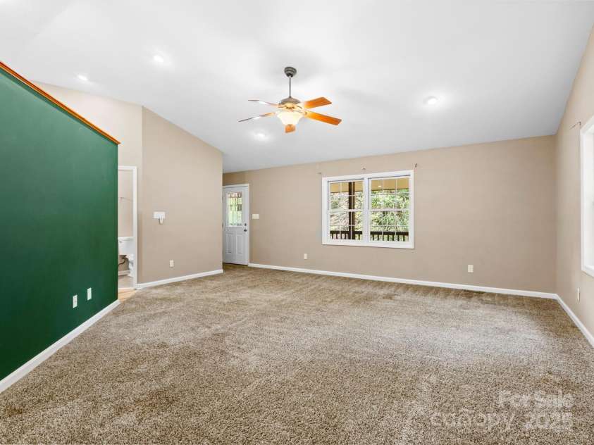 515 Pond Road, Asheville, NC 28806.  MLS# CAR4180837, YatesRealty ID 7674. Step right out onto your lovely covered deck from your family room and enjoy yourself a beautiful mountain sunset!
