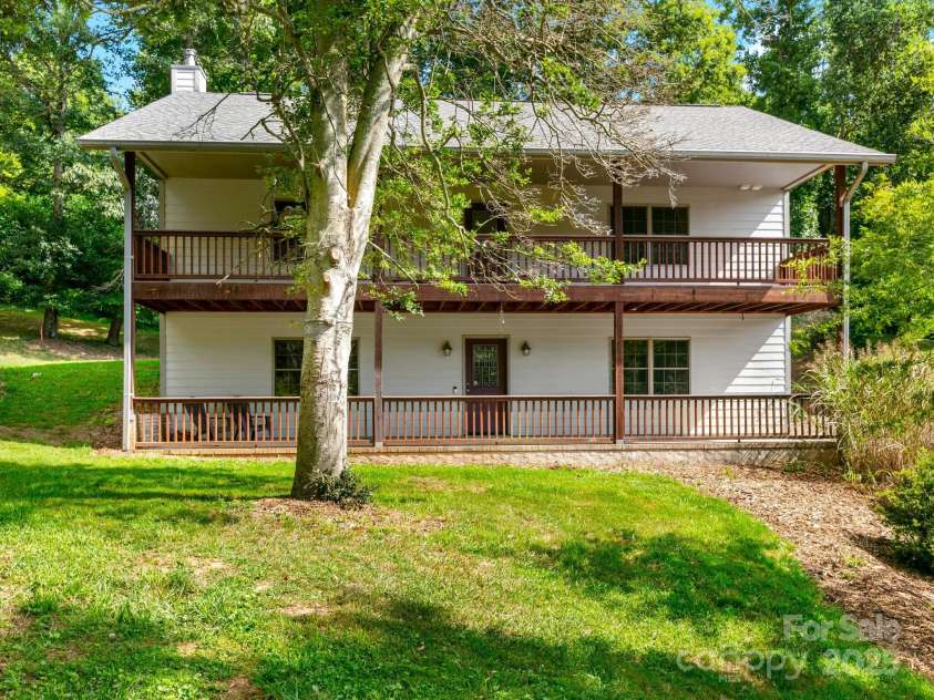 515 Pond Road, Asheville, NC 28806.  MLS# CAR4180837, YatesRealty ID 7674. Two covered decks to enjoy your cool mountain air on!