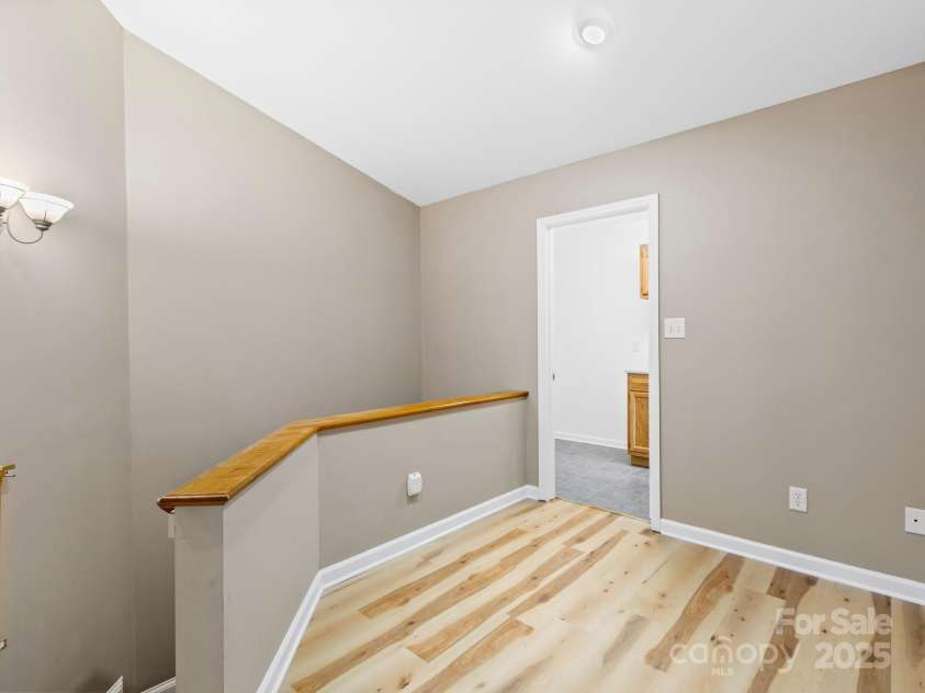515 Pond Road, Asheville, NC 28806.  MLS# CAR4302486, YatesRealty ID 7674. Upstairs hall with new LVP flooring 