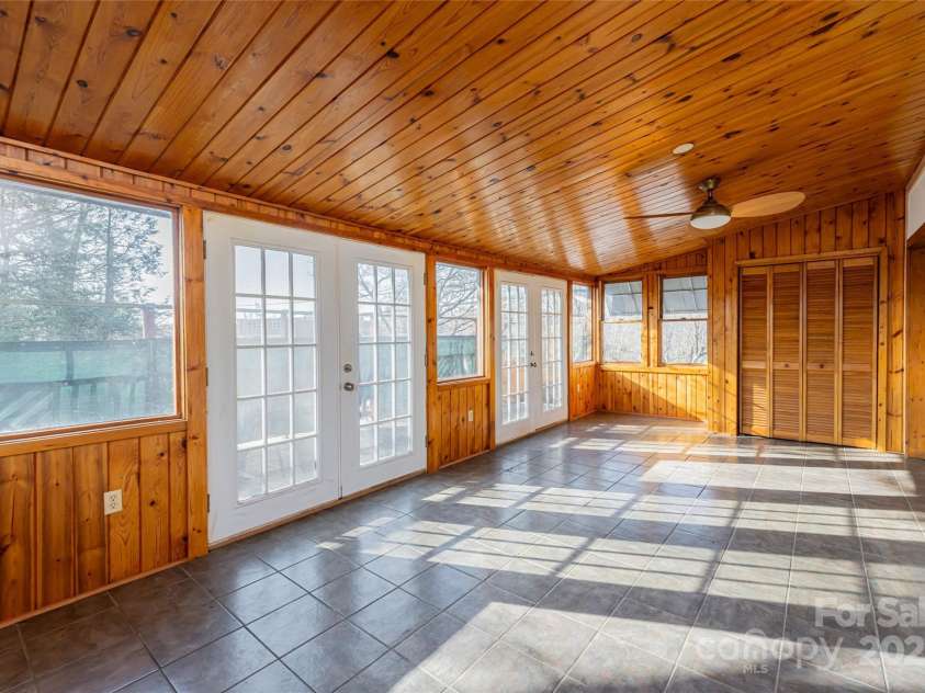 115 Elk Mountain Road, Asheville, NC 28804.  MLS# CAR4219629, YatesRealty ID 7675. Apartment has wood elements throughout