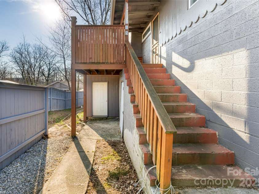 115 Elk Mountain Road, Asheville, NC 28804.  MLS# CAR4219629, YatesRealty ID 7675. Back entrance to aparment