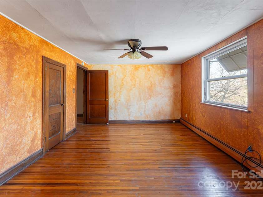 115 Elk Mountain Road, Asheville, NC 28804.  MLS# CAR4219629, YatesRealty ID 7675. Beautiful wood floors