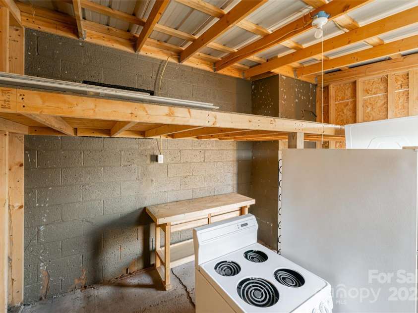 115 Elk Mountain Road, Asheville, NC 28804.  MLS# CAR4219629, YatesRealty ID 7675. Extra storage outside building