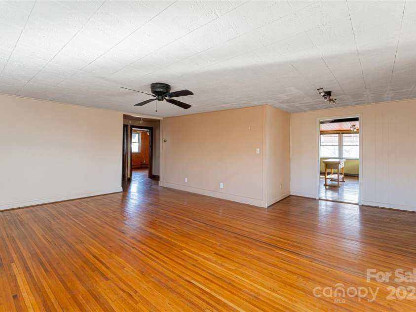115 Elk Mountain Road, Asheville, NC 28804.  MLS# CAR4219629, YatesRealty ID 7675. Original '40s wood flooring