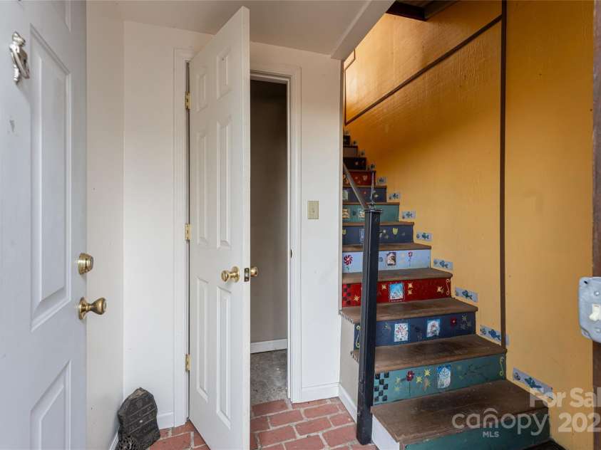 115 Elk Mountain Road, Asheville, NC 28804.  MLS# CAR4219629, YatesRealty ID 7675. Stairs leading to the apartment