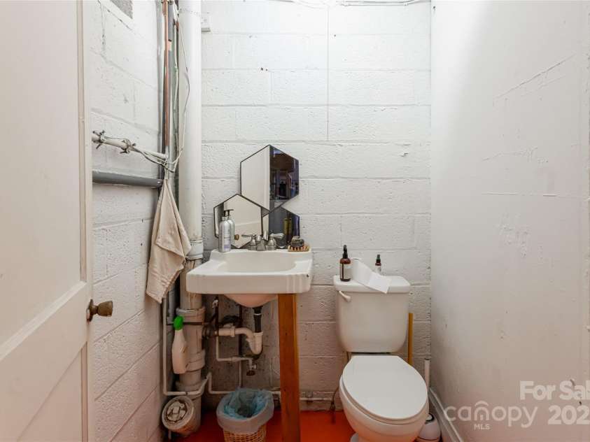 115 Elk Mountain Road, Asheville, NC 28804.  MLS# CAR4219629, YatesRealty ID 7675. Unit A and flex space bath