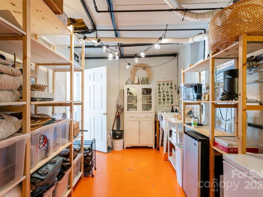 115 Elk Mountain Road, Asheville, NC 28804.  MLS# CAR4219629, YatesRealty ID 7675. Unit A and flex space  stockroom and storage