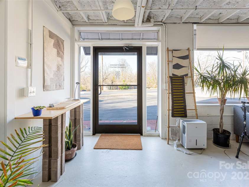 115 Elk Mountain Road, Asheville, NC 28804.  MLS# CAR4219629, YatesRealty ID 7675. Unit A - perfect for retail, design studio, art studio, you name it.