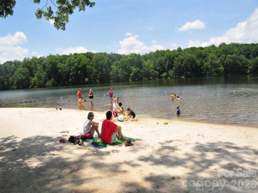 26 Balsam High Road, Biltmore Lake, NC 28715.  MLS# CAR4336811, YatesRealty ID 7678. Private beach access for residents