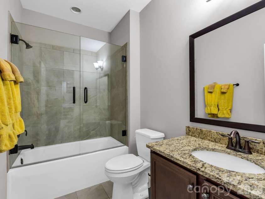 26 Balsam High Road, Biltmore Lake, NC 28715.  MLS# CAR4336811, YatesRealty ID 7678. Thoughtfully designed secondary bathroom