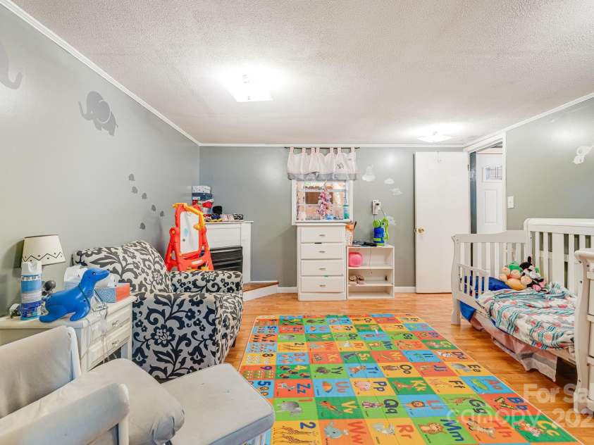 59 Rollins Street, Hendersonville, NC 28792.  MLS# CAR4212527, YatesRealty ID 7679. Family Room on Level 1