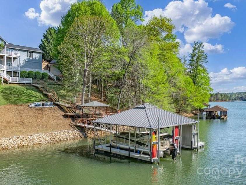 56 Lake Mist Court, Nebo, NC 28761.  MLS# CAR4242146, YatesRealty ID 7684. Kayaking or Paddle boarding anyone?