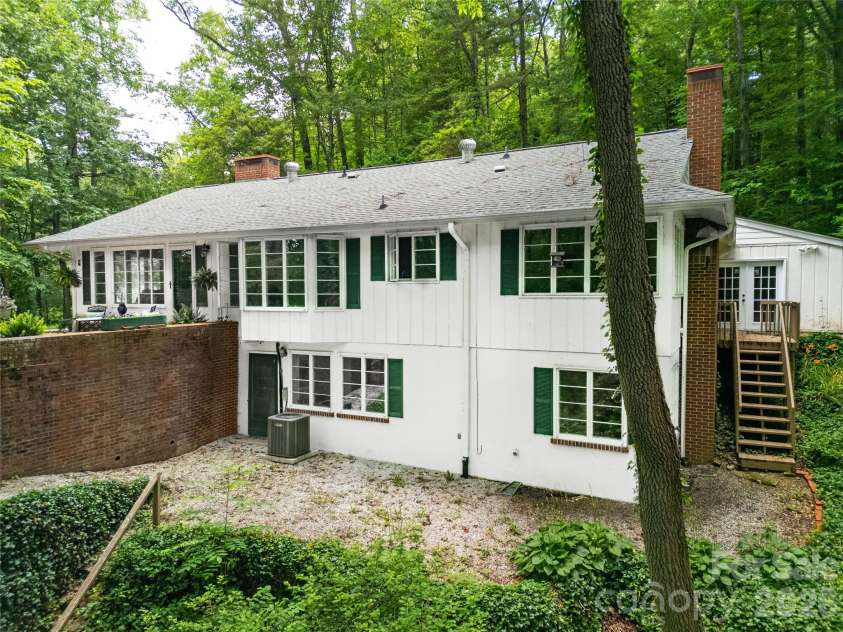 168 River Ridge Road, Brevard, NC 28712.  MLS# CAR4353588, YatesRealty ID 7686. Back of home