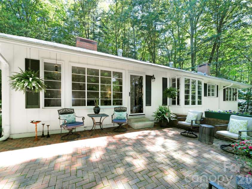 168 River Ridge Road, Brevard, NC 28712.  MLS# CAR4353588, YatesRealty ID 7686. Back patio
