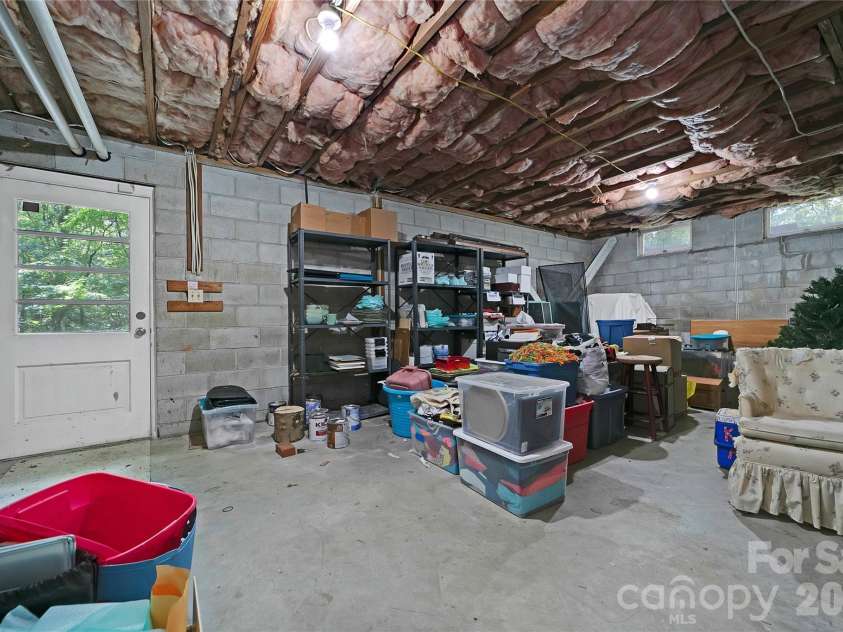 168 River Ridge Road, Brevard, NC 28712.  MLS# CAR4353588, YatesRealty ID 7686. Basement storage/utility