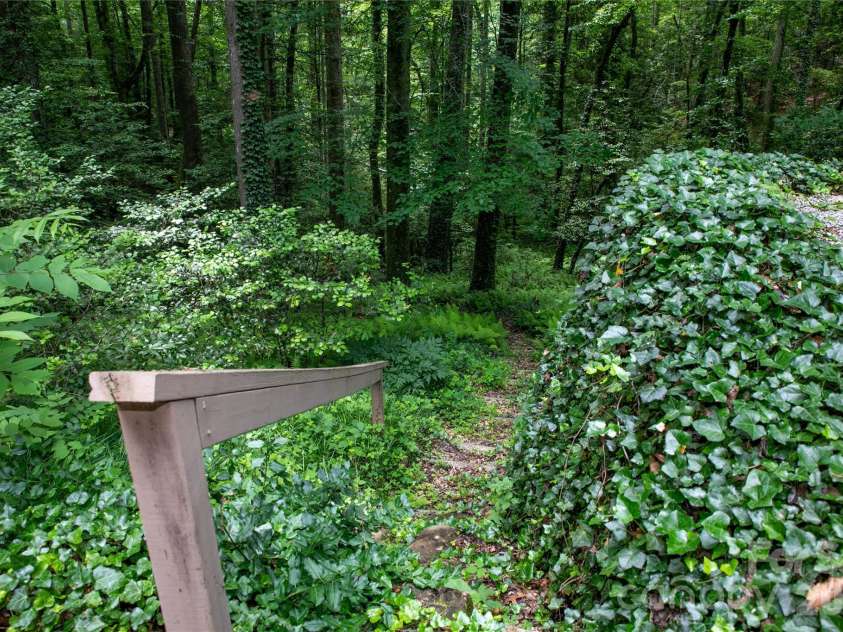168 River Ridge Road, Brevard, NC 28712.  MLS# CAR4353588, YatesRealty ID 7686. Path to trail