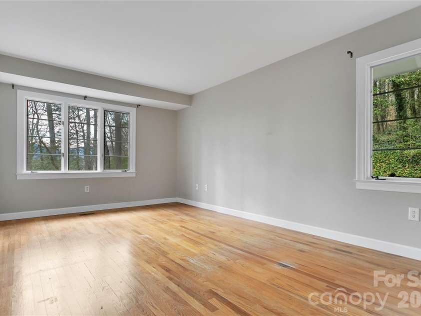 168 River Ridge Road, Brevard, NC 28712.  MLS# CAR4353588, YatesRealty ID 7686. Primary bedroom