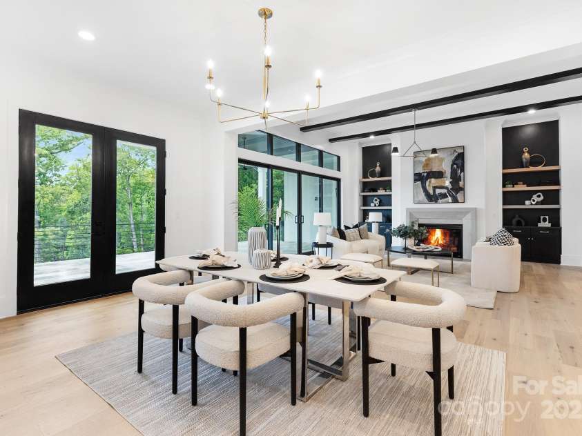 18304 Rosapenny Road, Charlotte, NC 28278.  MLS# CAR4329867, YatesRealty ID 769. Breakfast room with doors to open terrace area