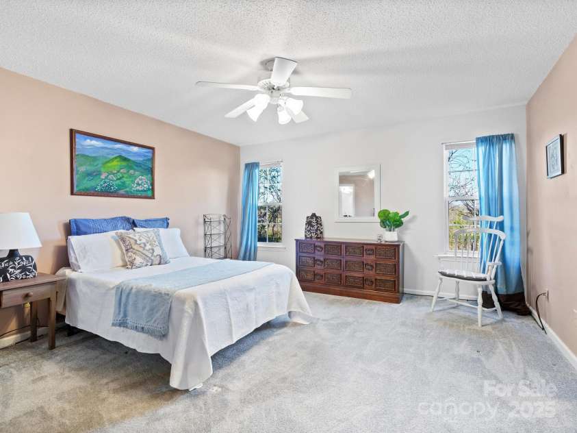 3405 Florham Place, Asheville, NC 28806.  MLS# CAR4245879, YatesRealty ID 7691. Exoansive primary bedroom with ample closet space and en-suite