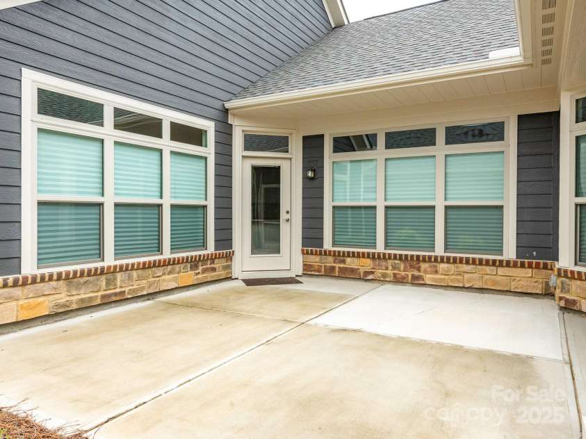 1346 Millview Lane, Matthews, NC 28104.  MLS# CAR4279682, YatesRealty ID 7692. Back Patio