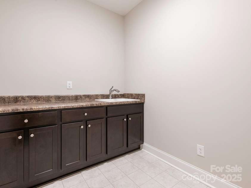 1346 Millview Lane, Matthews, NC 28104.  MLS# CAR4279682, YatesRealty ID 7692. Laundry Room