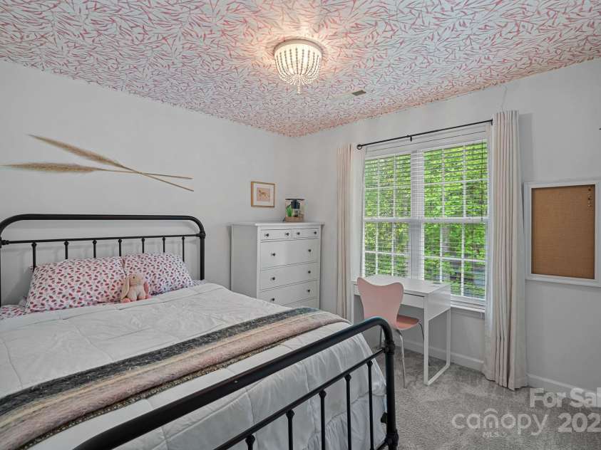 8600 Glade Court, Huntersville, NC 28078.  MLS# CAR4246992, YatesRealty ID 7694. Guest bedroom overlooking backyard!