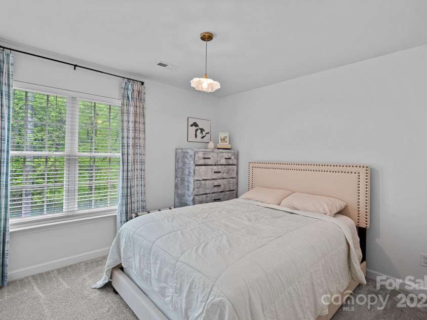 8600 Glade Court, Huntersville, NC 28078.  MLS# CAR4246992, YatesRealty ID 7694. Guest bedroom overlooking backyard!