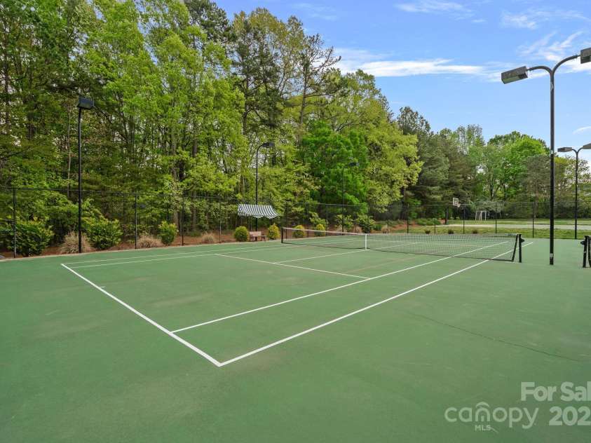 8600 Glade Court, Huntersville, NC 28078.  MLS# CAR4246992, YatesRealty ID 7694. Tennis and Pickleball!