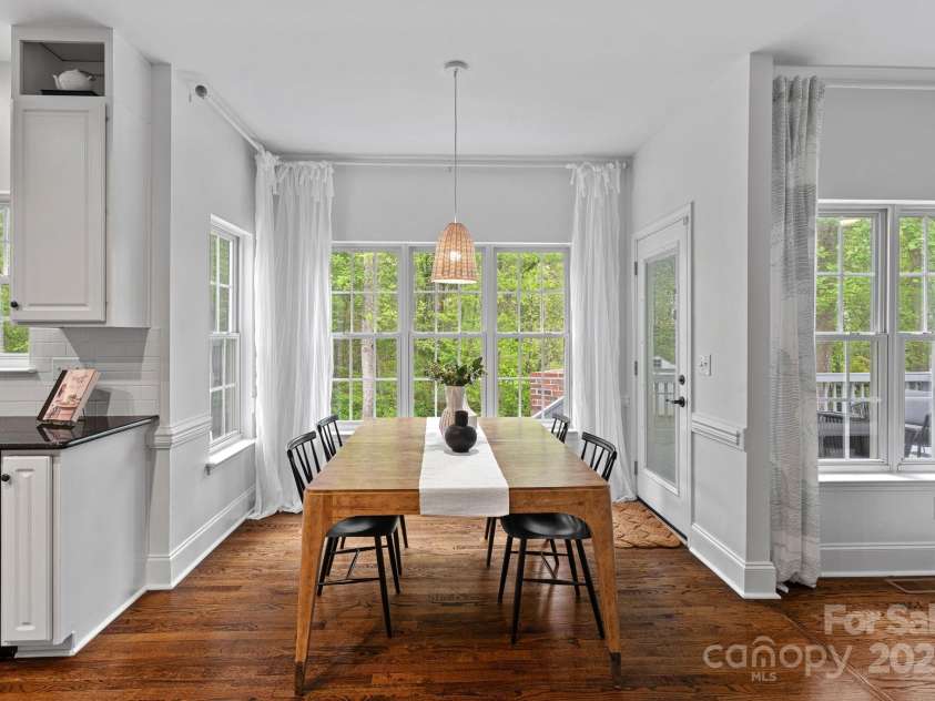 8600 Glade Court, Huntersville, NC 28078.  MLS# CAR4246992, YatesRealty ID 7694. The breakfast area leads to the spacious rear deck!