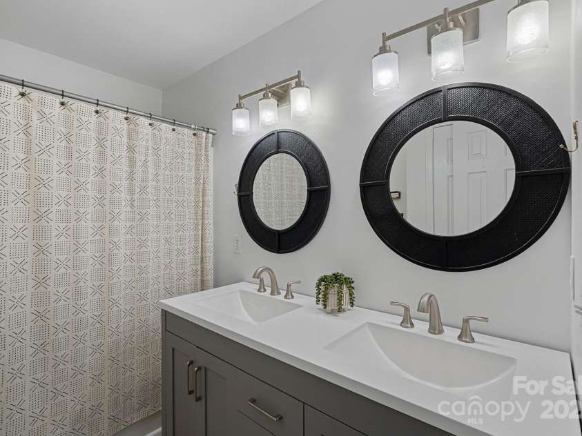8600 Glade Court, Huntersville, NC 28078.  MLS# CAR4246992, YatesRealty ID 7694. Updated bath, vanity with dual sinks!