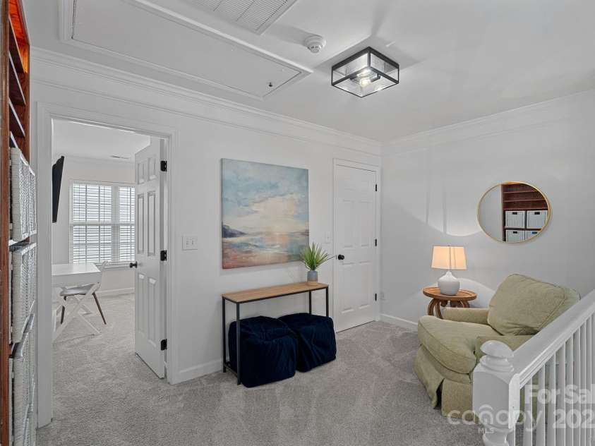 8600 Glade Court, Huntersville, NC 28078.  MLS# CAR4246992, YatesRealty ID 7694. Upstairs, you're greeted by a lovely loft with storage closet!