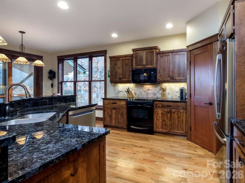 455 Ticoa Park Drive, Brevard, NC 28712.  MLS# CAR4330119, YatesRealty ID 7696. 