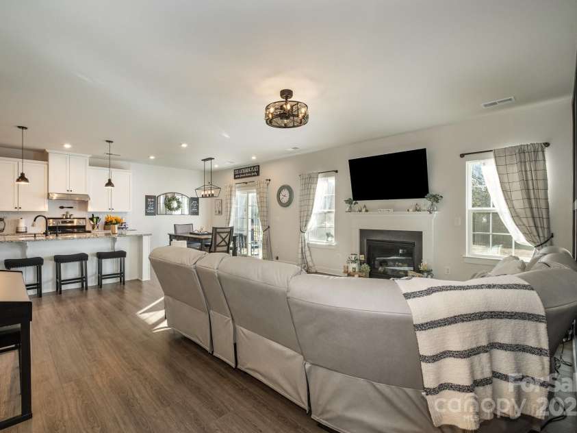 1844 Giana Lane, Monroe, NC 28112.  MLS# CAR4209401, YatesRealty ID 770. Bright and airry living room with custom accent wall