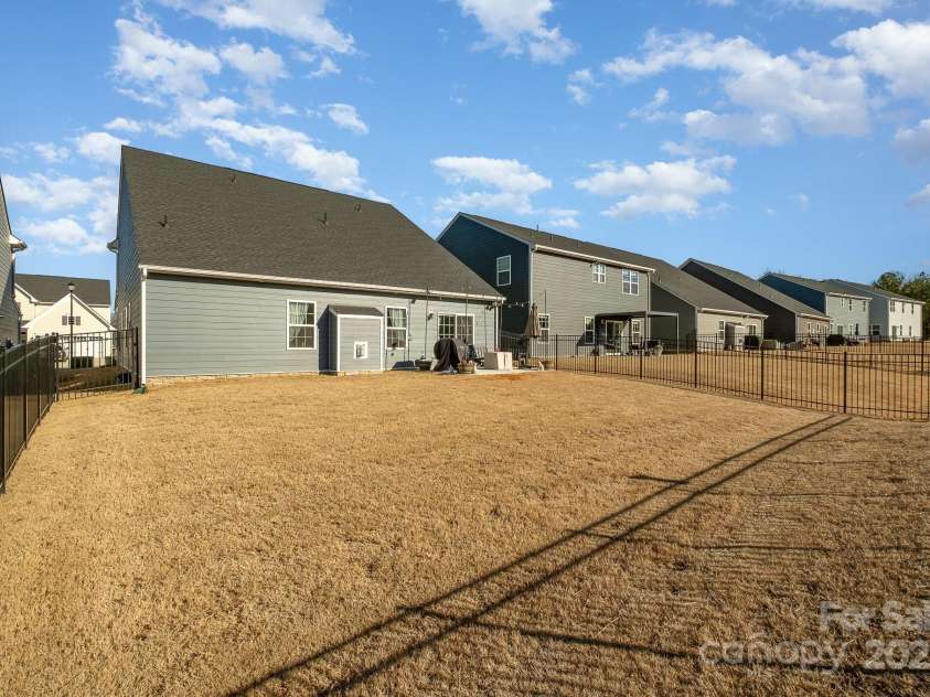 1844 Giana Lane, Monroe, NC 28112.  MLS# CAR4209401, YatesRealty ID 770. Large Fenced backyard