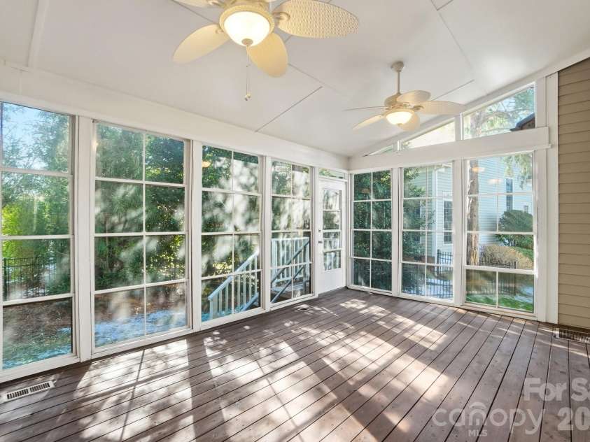 8044 Hawk Crest Court, Charlotte, NC 28270.  MLS# CAR4267919, YatesRealty ID 7700. Large porch with EZe breeze style screening system - 