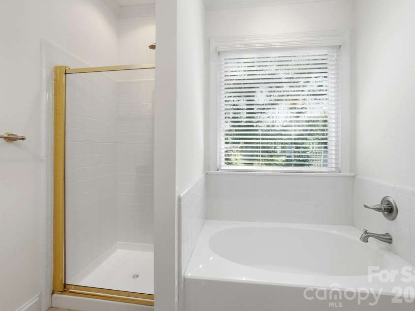 8044 Hawk Crest Court, Charlotte, NC 28270.  MLS# CAR4267919, YatesRealty ID 7700. Separate shower in primary bathroom
