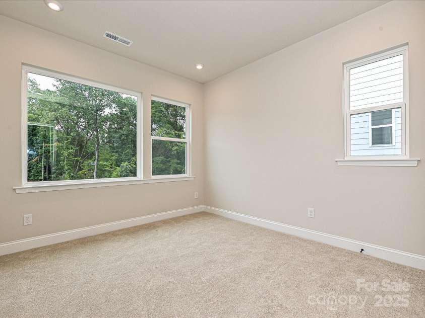 8034 Cedarsmith Court, Charlotte, NC 28217.  MLS# CAR4308403, YatesRealty ID 7701. Bedroom 3 With Extra Windows and Light.