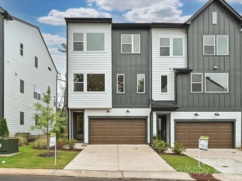 8034 Cedarsmith Court, Charlotte, NC 28217.  MLS# CAR4308403, YatesRealty ID 7701. Front Exterior with 2-bay side by side garage.